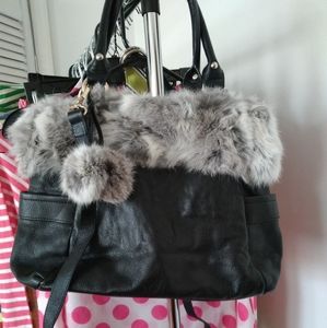 Black leather bag with fur trim